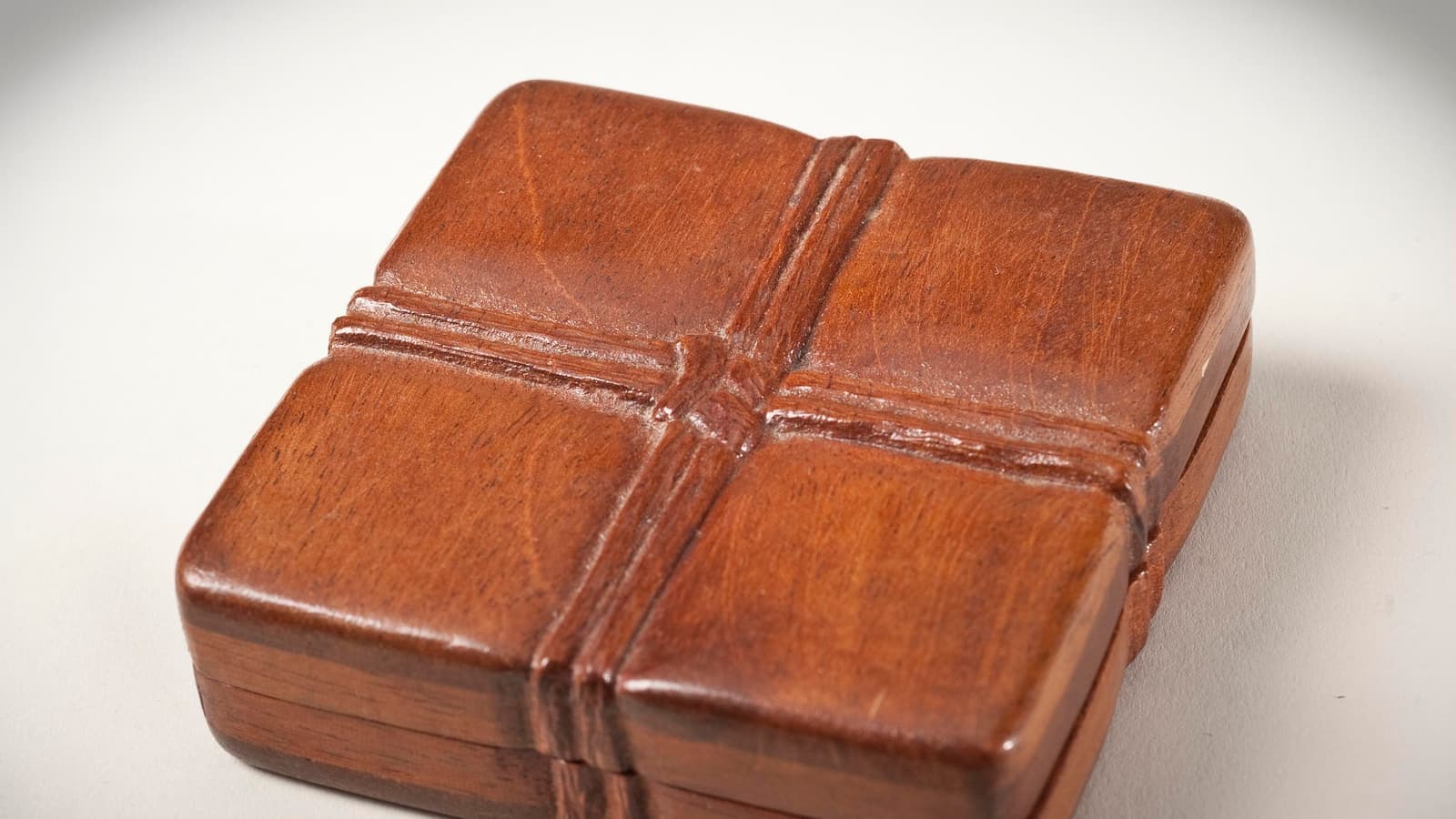 Small wrapped parcels arranged on a light surface