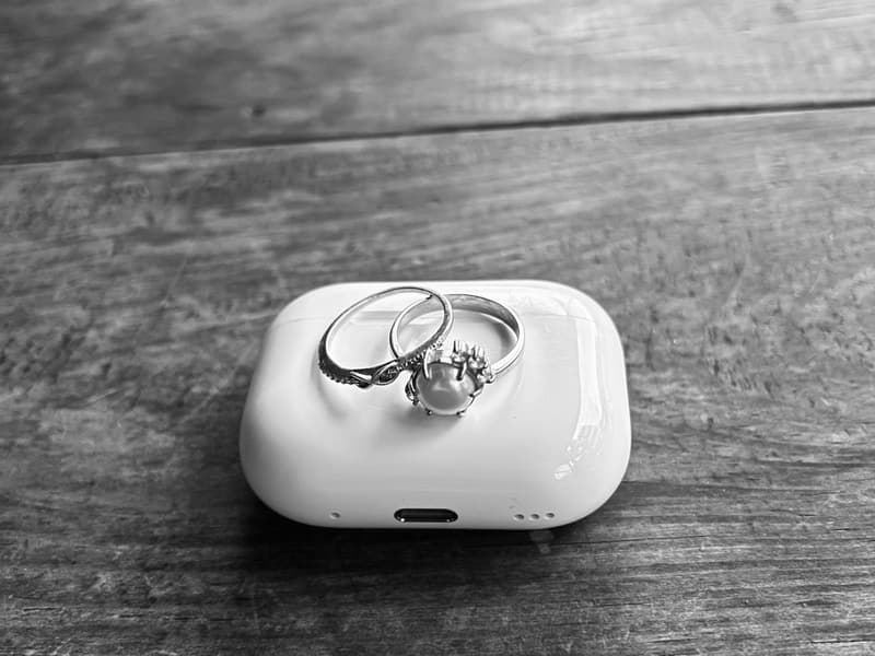 Wireless earbuds in an open charging case