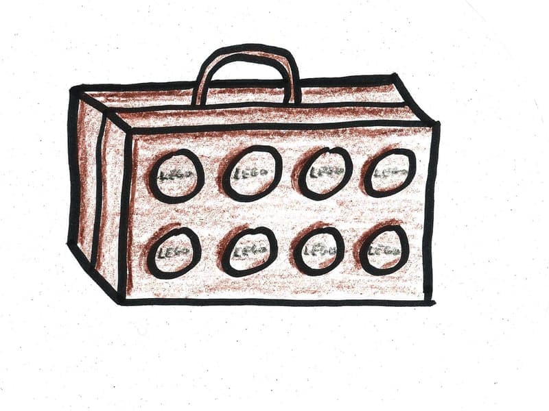 A hard-shell carry-on suitcase