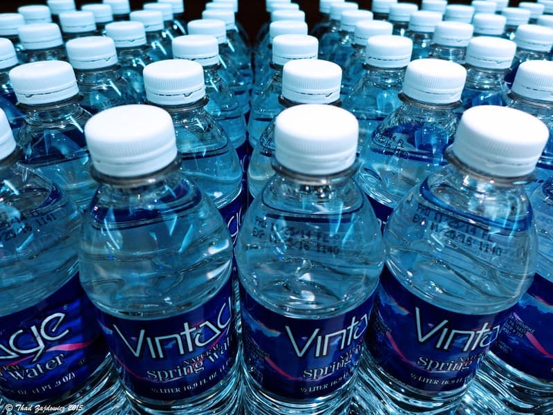An insulated water bottle on a pale background