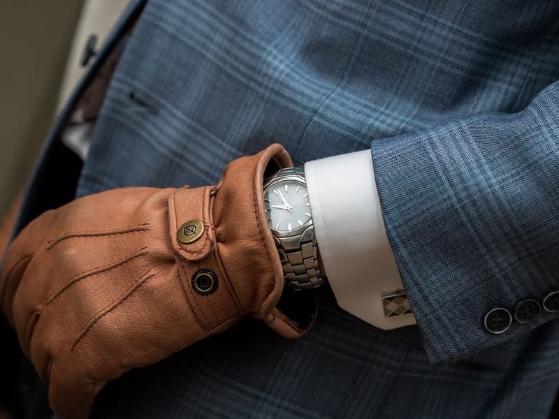 A dress watch with a leather strap