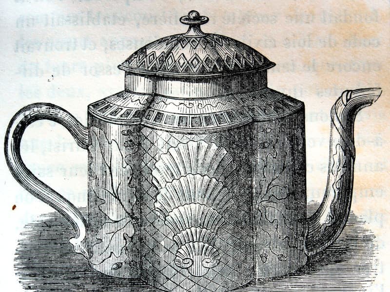 A tall insulated tumbler with a handle