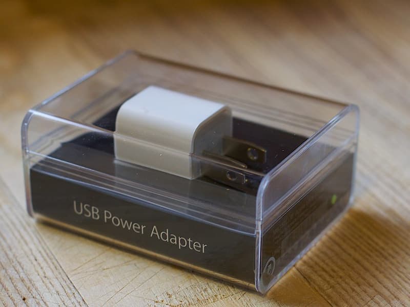 A travel plug adapter and cable