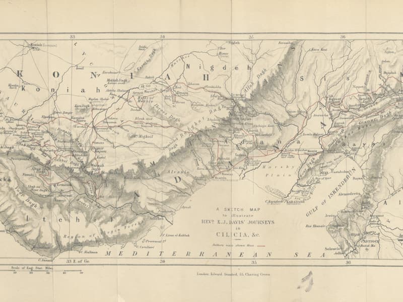 A journal and map on a table